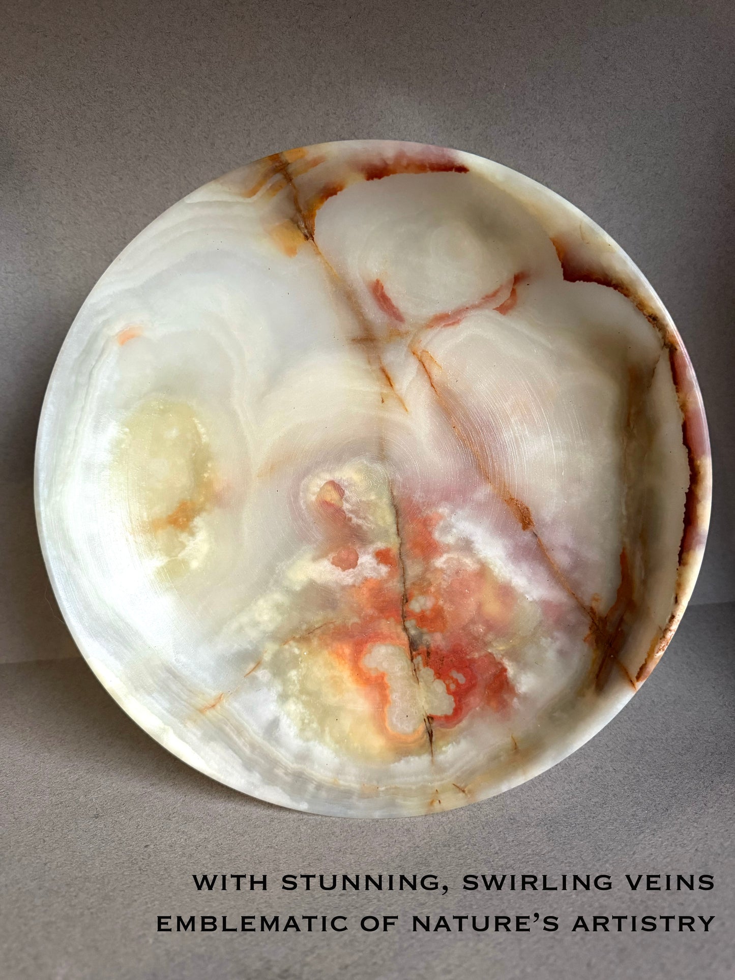 Marble stone with swirling veins on a gray background