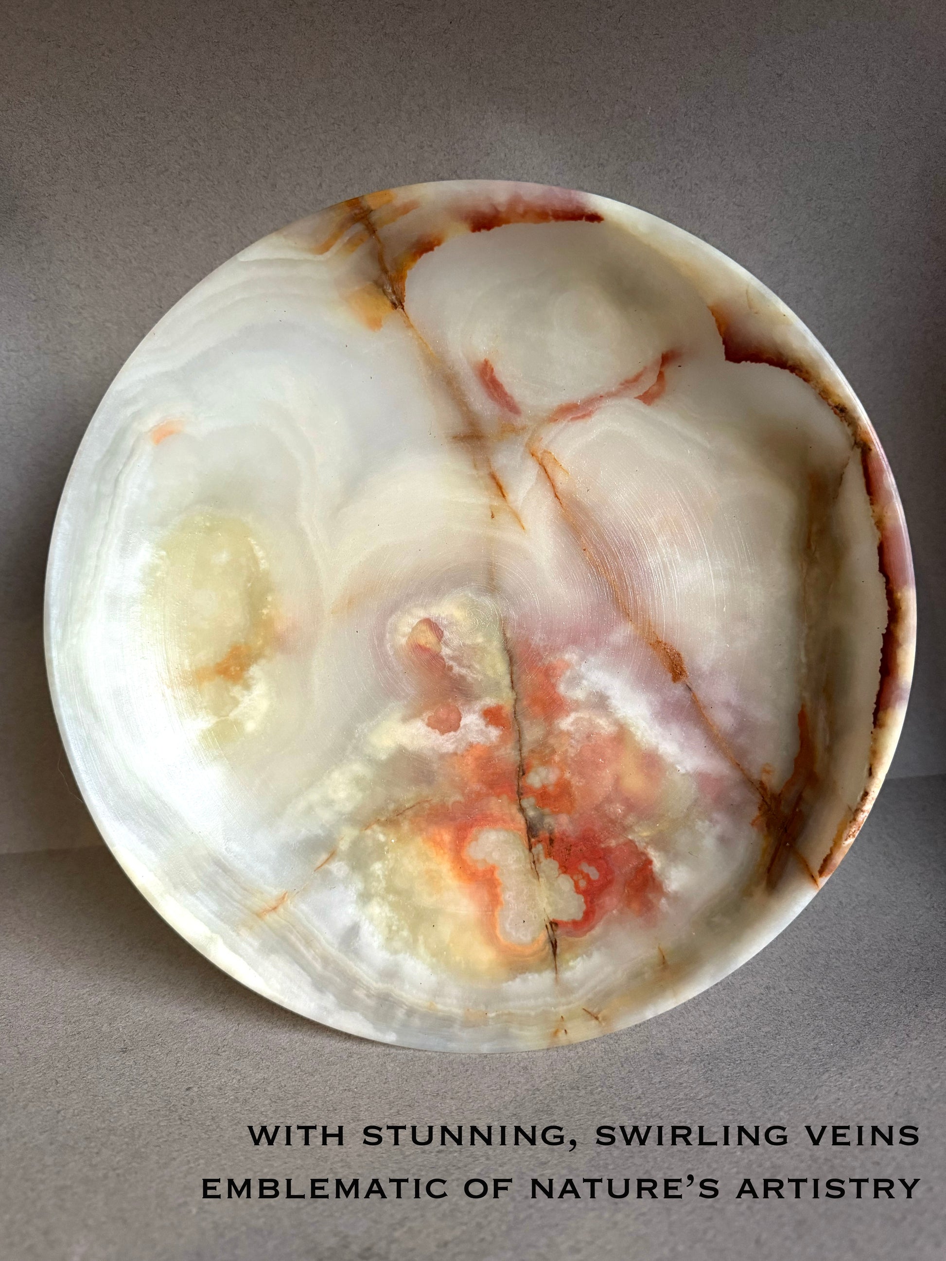 Marble stone with swirling veins on a gray background